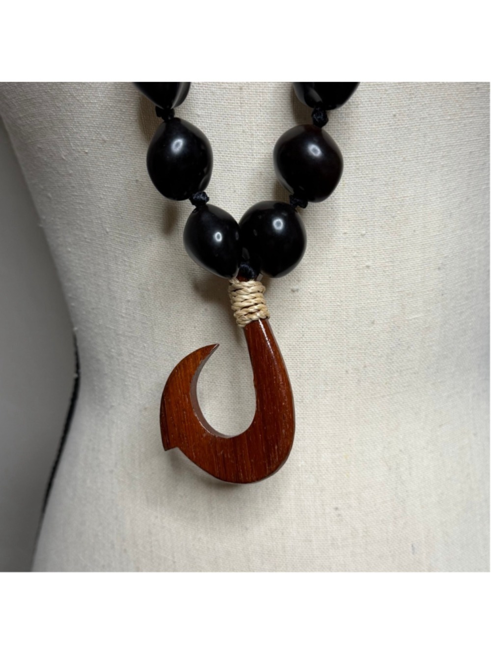 black kukui nut lei with a wooden fish hook pendant - Picture 4 of 4